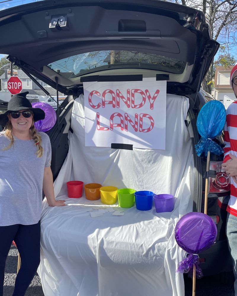 A Candy Land trunk with giant lollipops and colorful cups